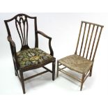 A 19th century mahogany splat-back carver chair with padded drop-in-seat, & on square tapered legs