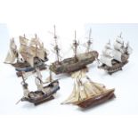 Five model galleons (various sizes).