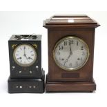 A late 19th/early 20th century mantel clock with blue roman numerals to the white enamel dial,