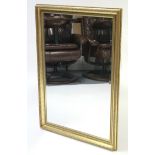 A large gilt frame rectangular wall mirror inset bevelled plate & with raised foliate border, 40”