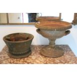 Two terracotta garden urns, slight faults, 19” & 15¼” diam.