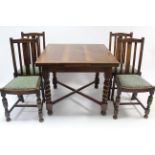 A 1930’s oak draw-leaf dining table on barley-twist legs with diagonal stretchers, 35” x 59½” (