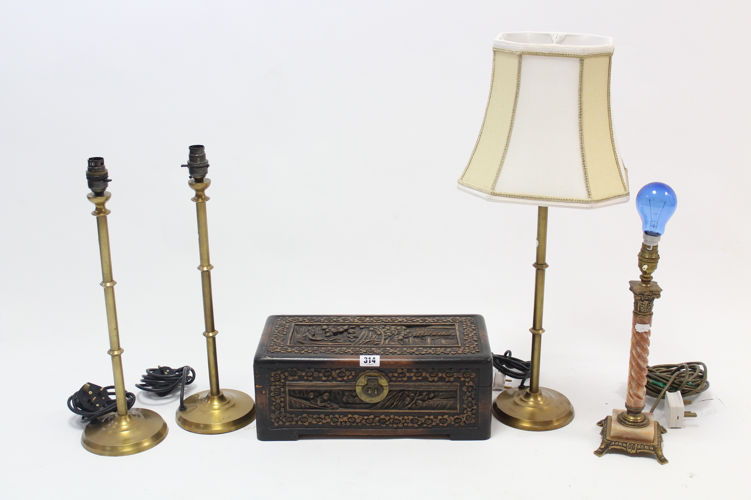 A Chinese carved camphor wood small trunk, 14¾” wide; & four modern table lamps.