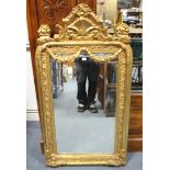 An 18th century-style gilt composition frame rectangular wall mirror (slight faults), 22½” x 41½”.