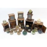 Seven various Edwardian smoker’s cabinets; & sixteen pottery tobacco jars.