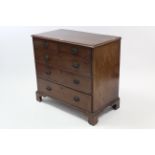 A Georgian mahogany chest fitted two short & two long graduated drawers with brass ring handles, &