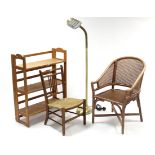 A spindle-back child’s chair with woven-string seat, & on short square legs with plain stretchers;