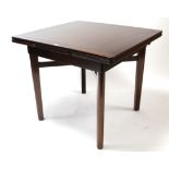 A mahogany draw-leaf dining table on square tapered legs with diagonal stretchers, 33” x 59¾” (