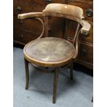 A bentwood elbow café chair with circular seat, & on shaped legs; & an oak low chest fitted two