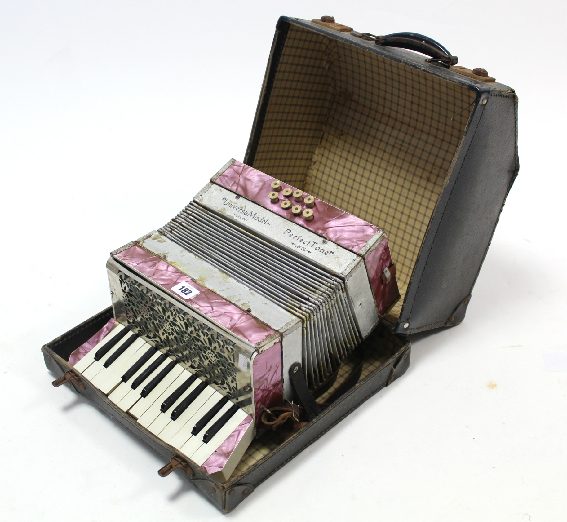 A Perfect Tone “Universal” model piano accordion, with fibre covered travelling case.