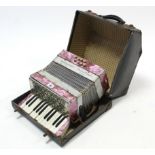 A Perfect Tone “Universal” model piano accordion, with fibre covered travelling case.