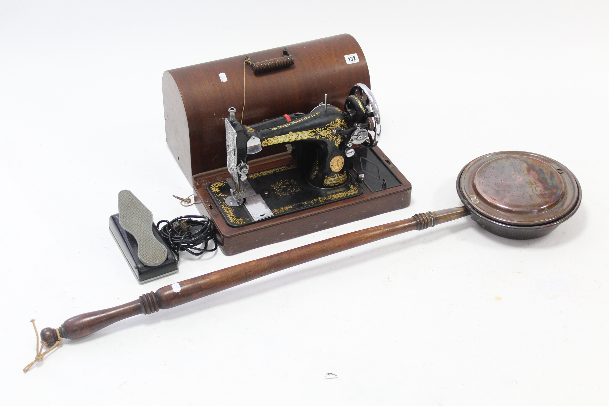 A Singer electric sewing machine with carrying case, w.o. & a 19th century copper engraved warming