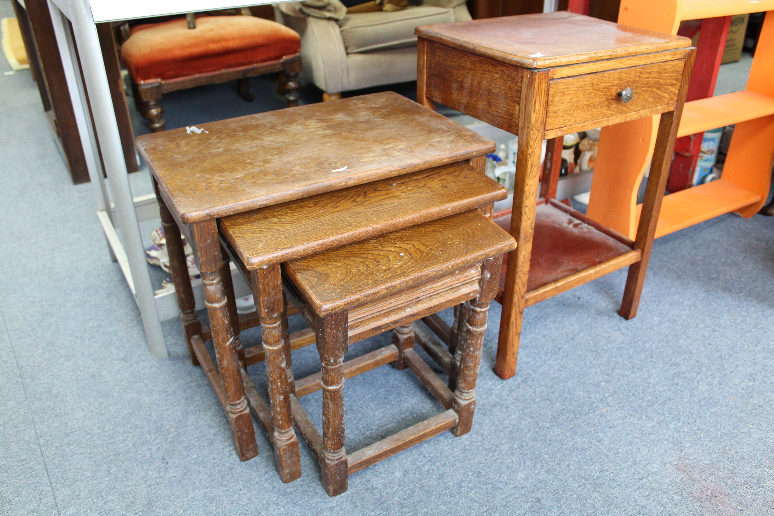 An oak nest of three rectangular occasional tables, each table on four baluster-turned legs with