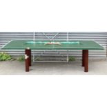 An Allison 4’ x 8’ table tennis table complete with stand & numerous accessories.