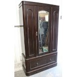 A Victorian mahogany wardrobe with moulded cornice, enclosed by rectangular centre mirror door,