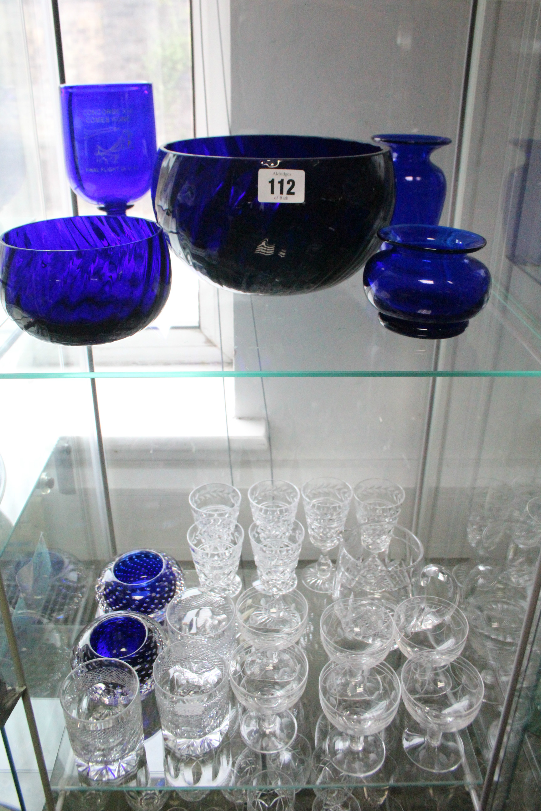 Various items of coloured & plain glassware.