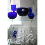 Various items of coloured & plain glassware.