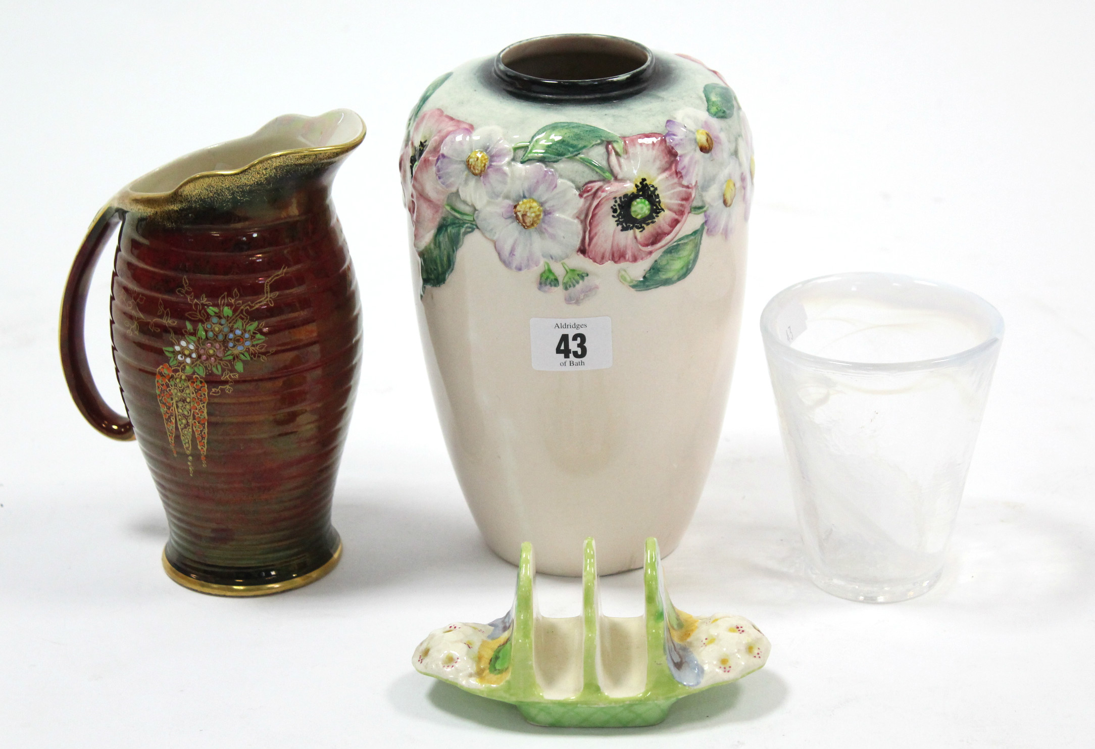 A Carlton ware floral decorated vase, 8” high; a Fieldings Crown Devon Rouge Royale jug, 7½” high; a