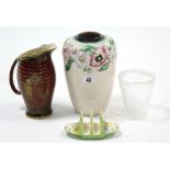 A Carlton ware floral decorated vase, 8” high; a Fieldings Crown Devon Rouge Royale jug, 7½” high; a