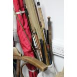 Six fly fishing rods; two pairs of skis; & one pair of ski poles.