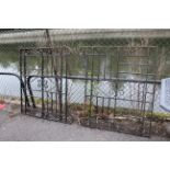 A pair of black painted wrought-iron garden gates, 40½” x 46½”; & a set of black painted wrought-