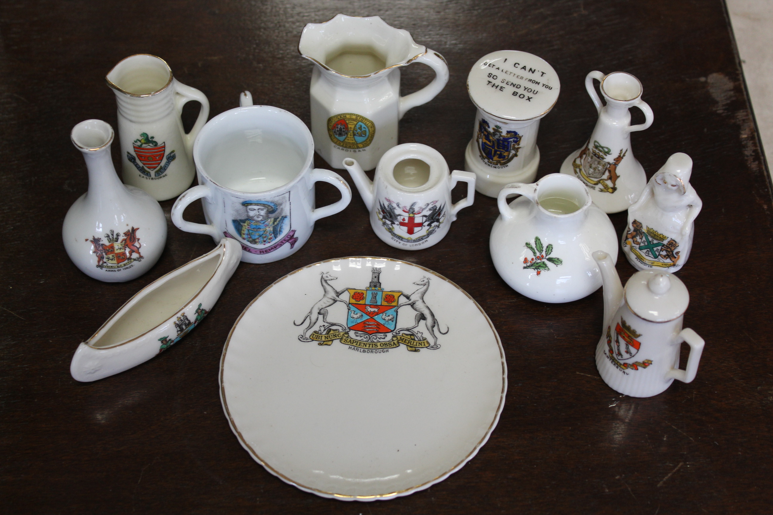 Approximately thirty various items of crested china.