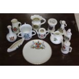 Approximately thirty various items of crested china.