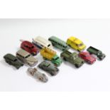 Twelve Dinky die-cast scale models including a “Speed of The Wind” racing car (No. 23E); a “Caravan”