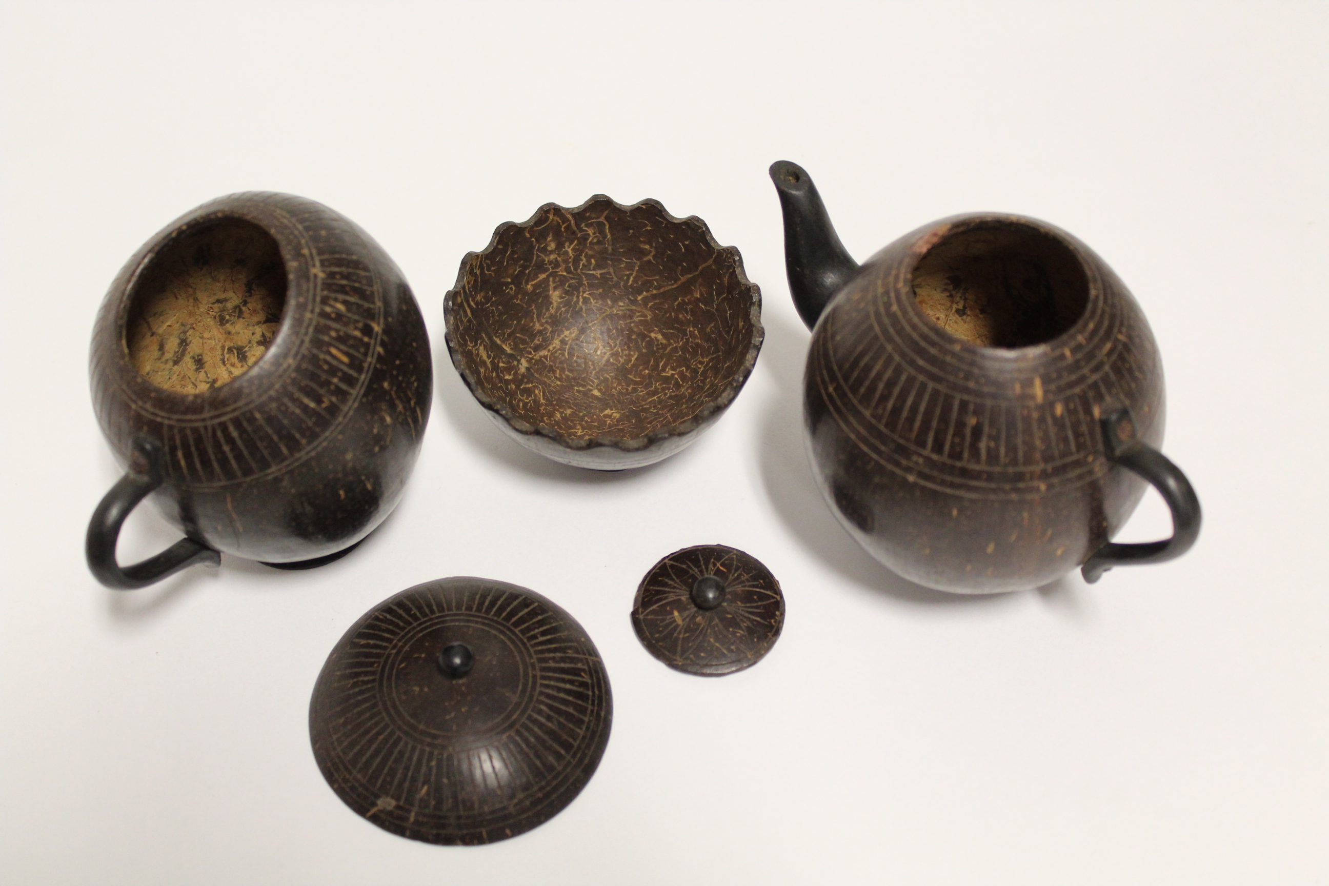 A 1920’s Sri Lankan carved coconut shell fifteen piece tea service (settings for six), part w.a.f. - Image 4 of 4