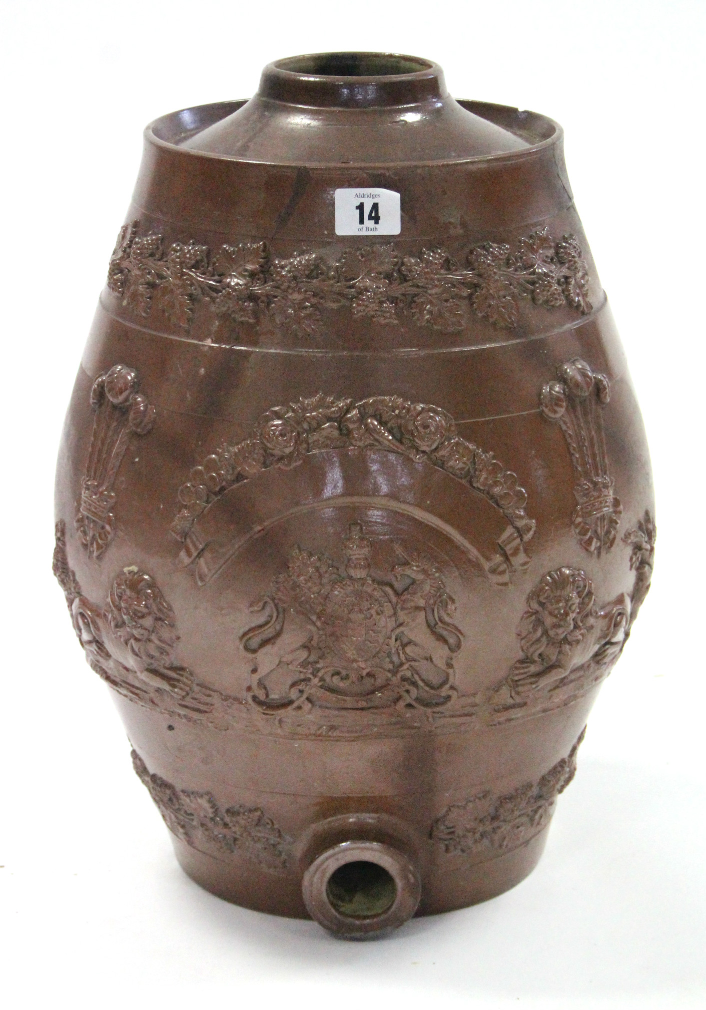 A large brown glazed stoneware barrel with raised coat-of-arms of the Earl of Shaftsbury, 17”