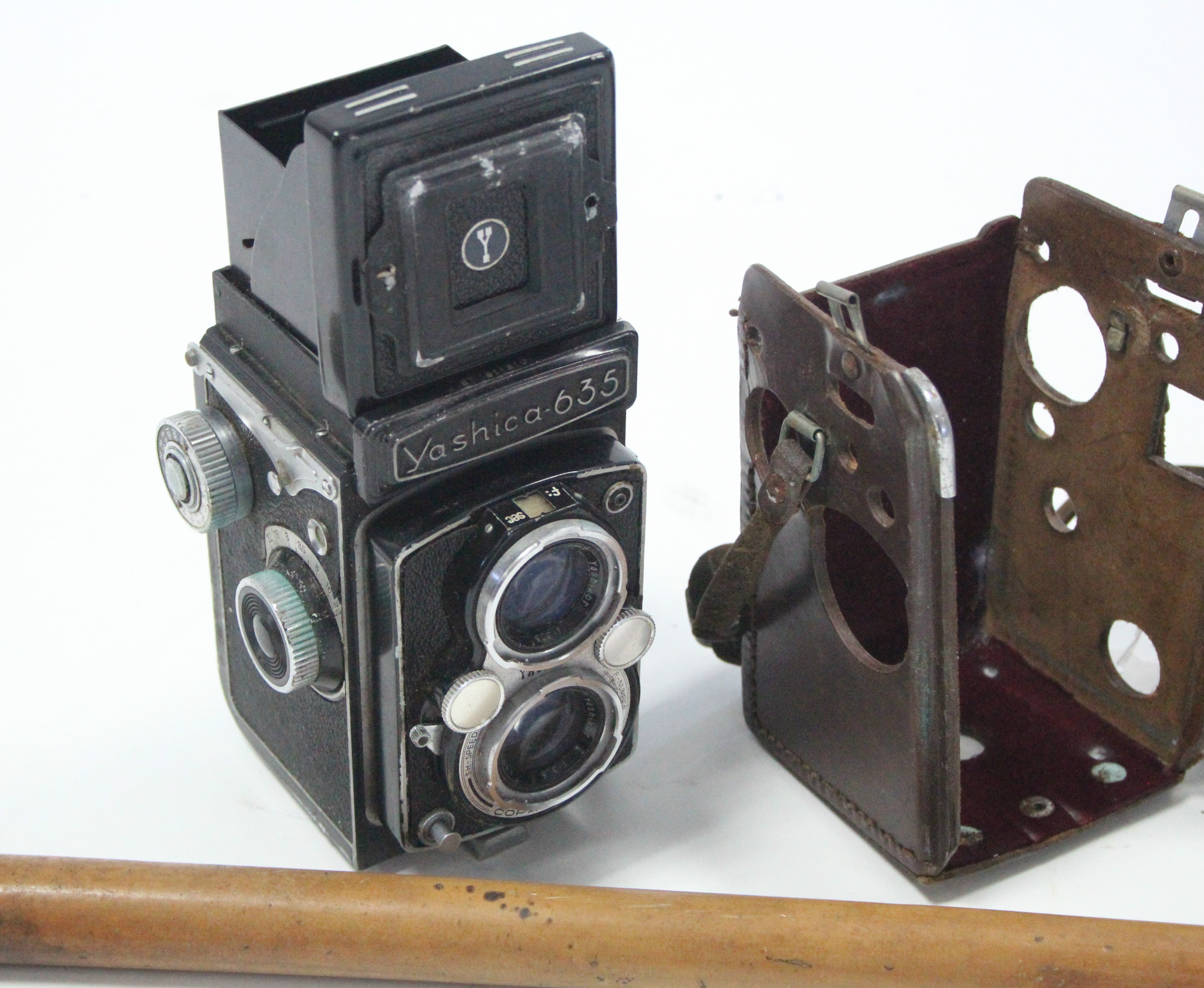 A Yashika “635” box camera with leather case; & a gent’s walking cane with plated mount.