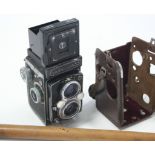 A Yashika “635” box camera with leather case; & a gent’s walking cane with plated mount.