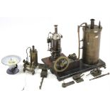 A brass scratch-built stationary steam engine, 16¾” high; & two similar smaller ditto.