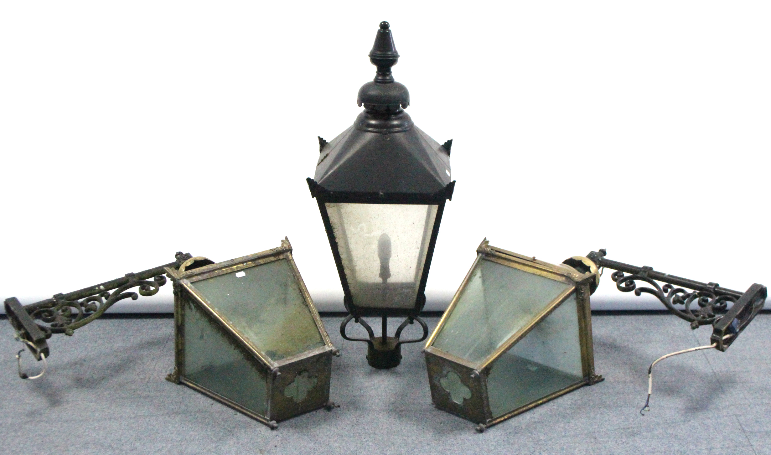 A pair of brass exterior wall lanterns of square tapered form, & with cast iron wall bracket, 25”