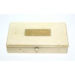A 1920’s bone rectangular trinket box with 18ct. gold inscription plaque to the hinged lift-lid &