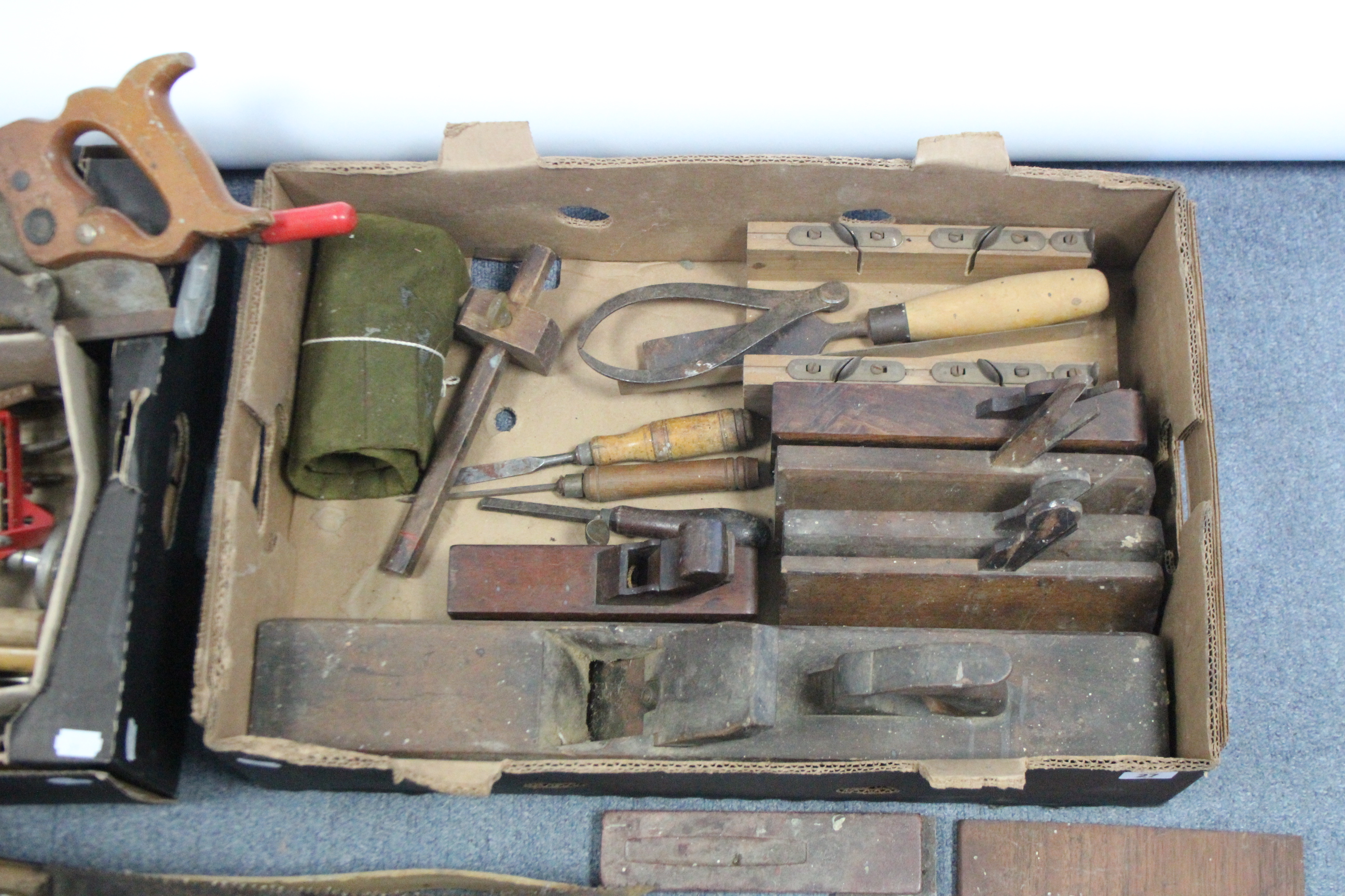 Seven various carpenter’s planes; together with various other carpenter’s tools & gardening tools.