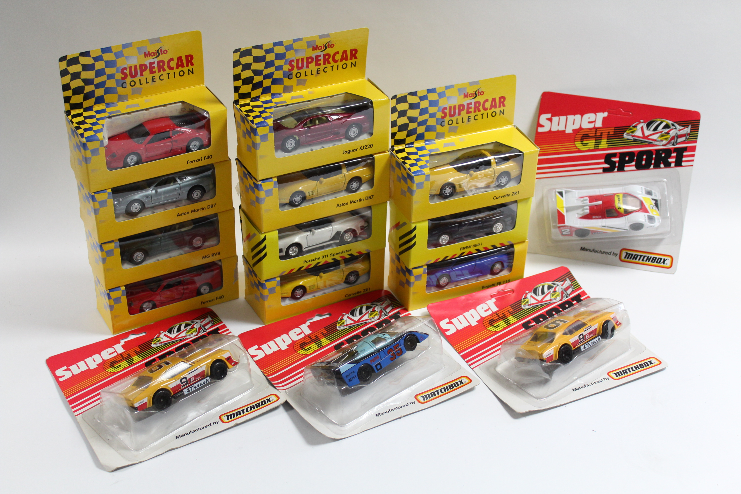 Approximately twenty various scale model cars by Matchbox, Maisto, & others, all with original