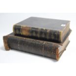 A mid-19th century Holy Bible printed by Eyre & Spottiswoode; & a leather-bound volume “The