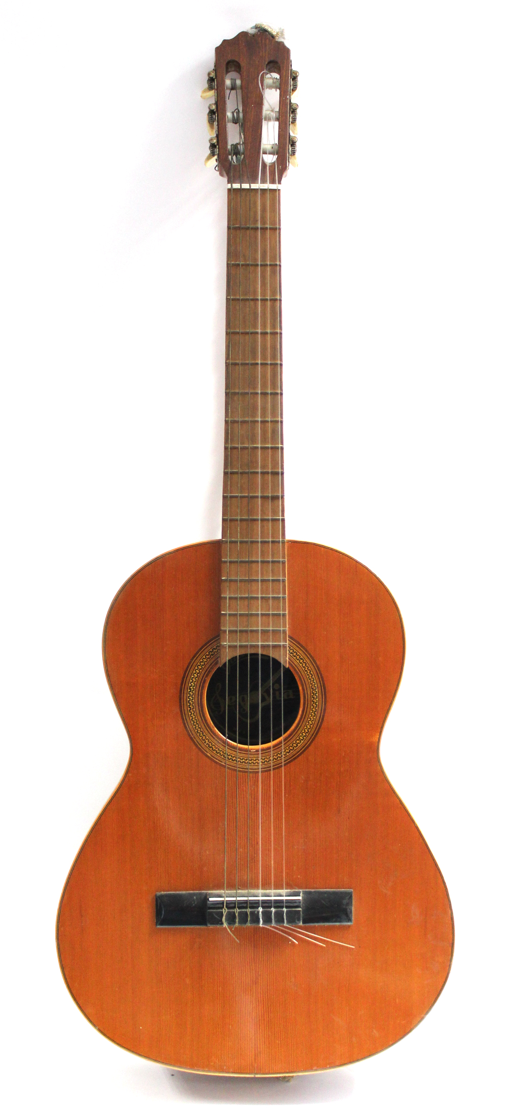 A Spanish six-string acoustic guitar.