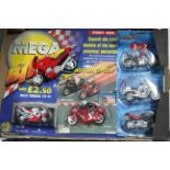 Approximately fifty various scale model motorcycles, all boxed.