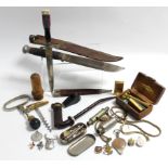 Two hunting knives, each with sheath; two corkscrews; three whistles, etc.