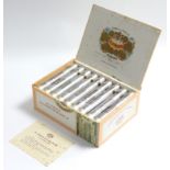 A box of twenty-five H. Upmann “Corona Major” Cuban cigars.