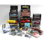 Approximately twenty various scale models by Matchbox Superkings, Burago, Maisto, etc., all boxed.
