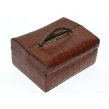 A late 19th /early 20th century snakeskin-covered small travelling toilet case stamped “J. C.