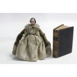 A Victorian china & wood miniature doll dressed in Elizabethan costume (lower right leg