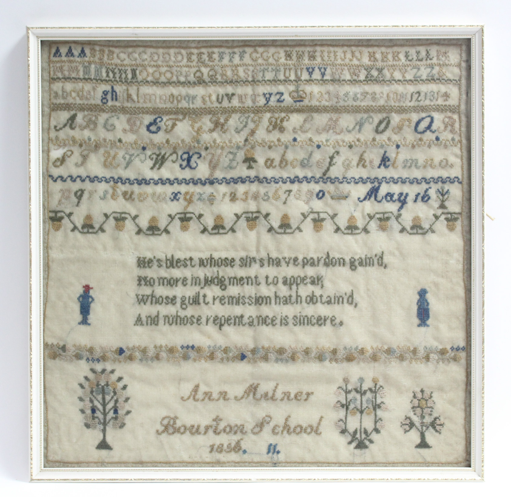 A mid-19th century needlework sampler with alphabet & numbers to the top, verse to centre &