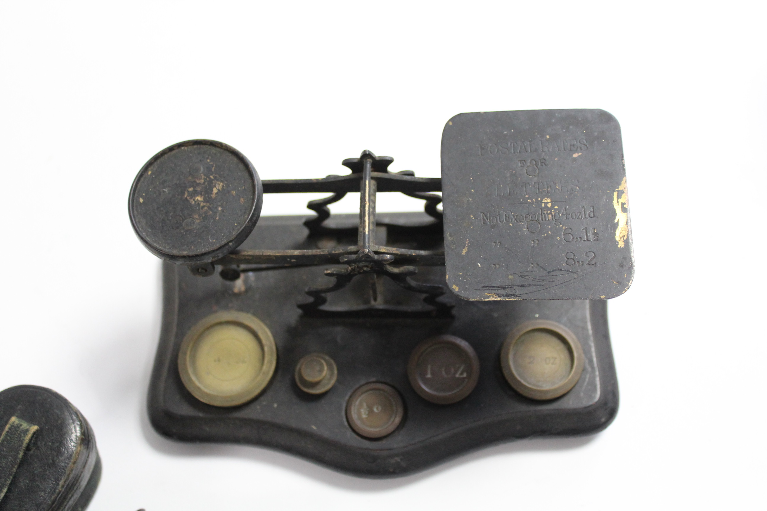A brass letter scale with five brass weights & mounted on ebonised serpentine front plinth base; & a - Image 4 of 4