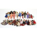 Three 1960’s Mattel Barbie dolls; a ditto Ken doll; a 1964 Palitoy Action Man figure; & various