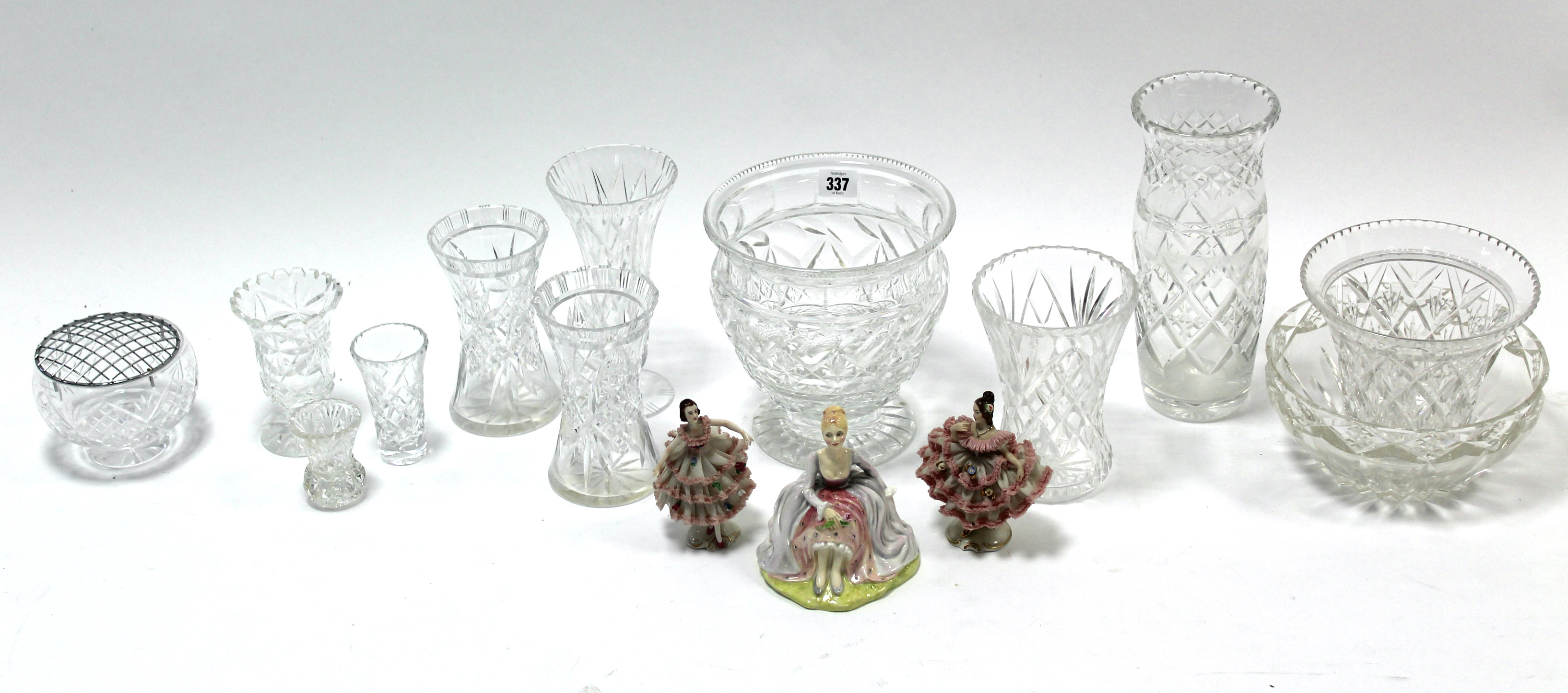 Ten various heavy cut-glass vases; a cut-glass fruit-bowl & rose bowl; & three porcelain figures,