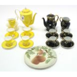 A Royal Worcester china eleven piece part coffee service of yellow ground; a Maling ten-piece part